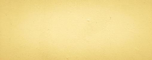 abstract yellow concrete wall texture background, panoramic background photo