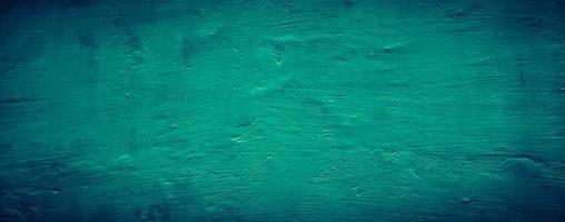 dark emerald green grungy abstract concrete wall texture background, panoramic background photo