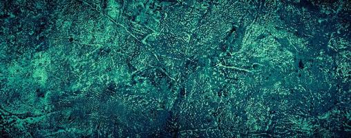 Fondo de textura de pared de hormigón abstracto sucio verde esmeralda oscuro, fondo panorámico foto