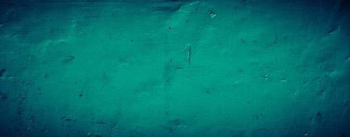 dark emerald green grungy abstract concrete wall texture background, panoramic background photo