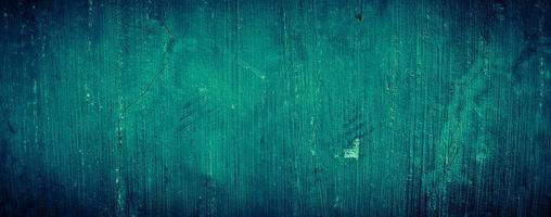 dark emerald green grungy abstract concrete wall texture background, panoramic background photo