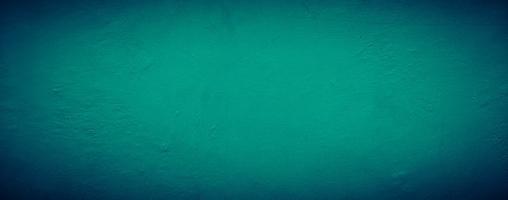 dark emerald green grungy abstract concrete wall texture background, panoramic background photo