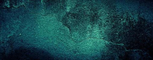 Fondo de textura de pared de hormigón abstracto sucio verde esmeralda oscuro, fondo panorámico foto