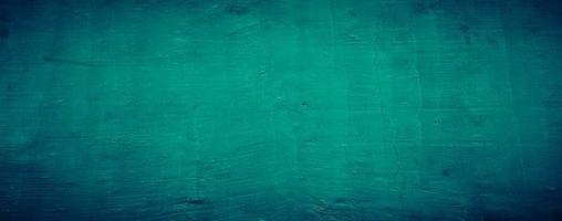 dark emerald green grungy abstract concrete wall texture background, panoramic background photo