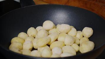 Young Potatoes cooking in Pan. video