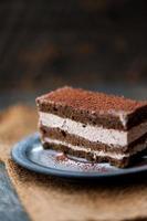 Slice of tasty homemade chocolate cake photo