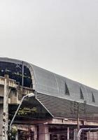 Cityscape architecture and rain at Makkasan station in Bangkok Thailand. photo