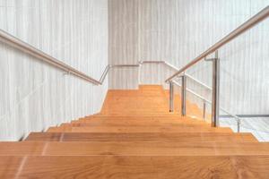 Modern space of wooden stairs interior design in modern building photo