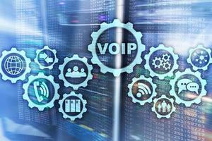 VoIP Voice over IP on the screen with a blur background of the server room. The concept of Voice over Internet Protocol