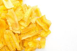 Banana Chips on white background photo