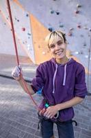 A rock climber trains on artificial terrain. photo