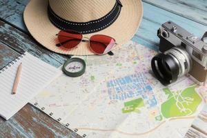 Compass with film camera and accessories for travel planning