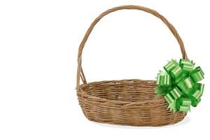 Empty wicker basket with ribbon isolated on white and clipping path photo