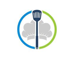 Circle shape with spatula and chef hat inside vector