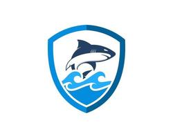 Simple shield with jumping shark in the sea vector