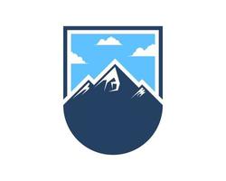 Simple shield with mountain and clear sky inside vector