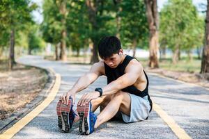 Men warm up before and after exercising photo
