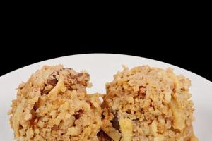 Millets with fruits on a black background photo