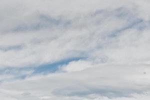 Clear blue sky with plain white cloud with space photo