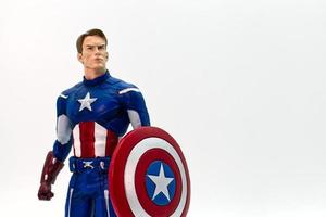 Bologna, Italy, 2019 - Captain America action figure isolated on white background. Superheroes Comic books by Marvel. Empty space for text. Close-up. photo