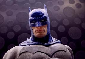 Bologna, Italy, 2022 - Batman action figure isolated on black background. Batman from DC comics. photo