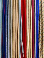 Various new shoe laces on display photo