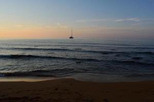 boat by shore stand photo
