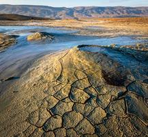Mud volcanoes with stunning sunrise in Chahuna managed reserve in Georgia.