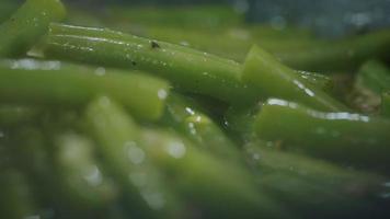 Green Beans Cooking. Close Up Slow Motion Food.