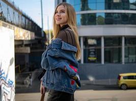 Girl stands in the bridge photo