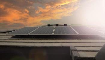 Photovoltaic. Solarcell panel. Solar roof power plant on the roof photo