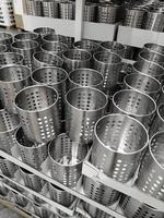 perforated metal utensils. kitchen dishes