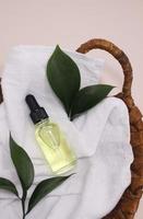 organic spa with natural cosmetics in a minimalist style. cosmetic serum, face skin care oil. photo