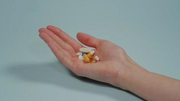 Handful of tablets of various shapes. video