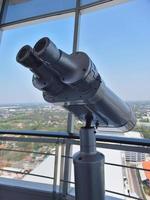 Large binoculars can be used for viewing views on tall buildings. photo