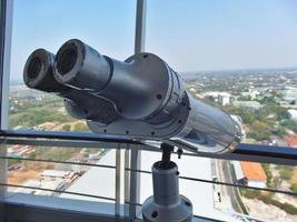 Large binoculars can be used for viewing views on tall buildings. photo