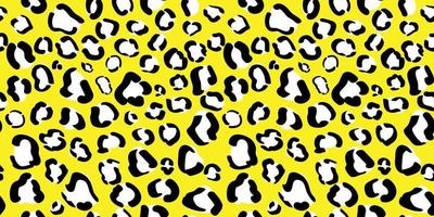 Yellow leopard print seamless pattern. Cheetah animal skin background. Wrapping paper or fabric design vector