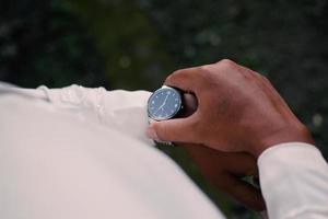 Man's watch on hand. Wedding ceremony photo