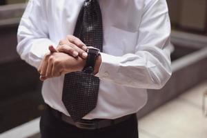 Man's watch on hand. Wedding ceremony photo