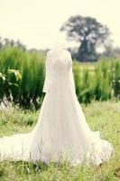 Luxurious wedding dress worn in ceremony photo