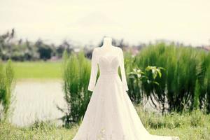 Luxurious wedding dress worn in ceremony photo