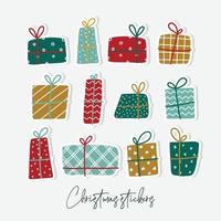 conjunto de pegatinas navideñas, regalos dibujados a mano. bueno para carteles, planificadores, álbumes de recortes, tarjetas, etc. eps 10 vector