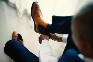 Stylish man in brown shoes photo