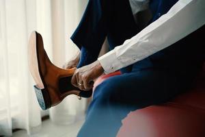 Stylish man in brown shoes photo