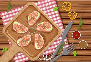 Smoked salmon bruschetta with vegatable ingredient on the wooden table background vector