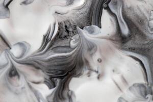 abstract white and gray beautiful liquid marble fluid acrylic paint vibrant texture. photo