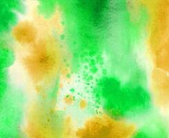 abstract watercolor green and yellow hand painted gradient paint grunge texture and color splash pattern. photo