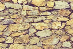 abstract stone wall realistic texture ornament building rock on nature. photo