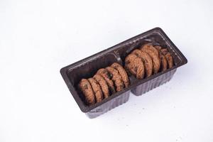 Chocolate cookies on a white table photo