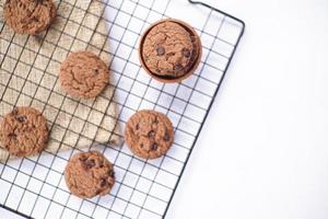 Chocolate cookies on a white table photo